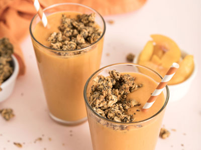 Peach-Turmeric Smoothie with Peanut Butter Crumble